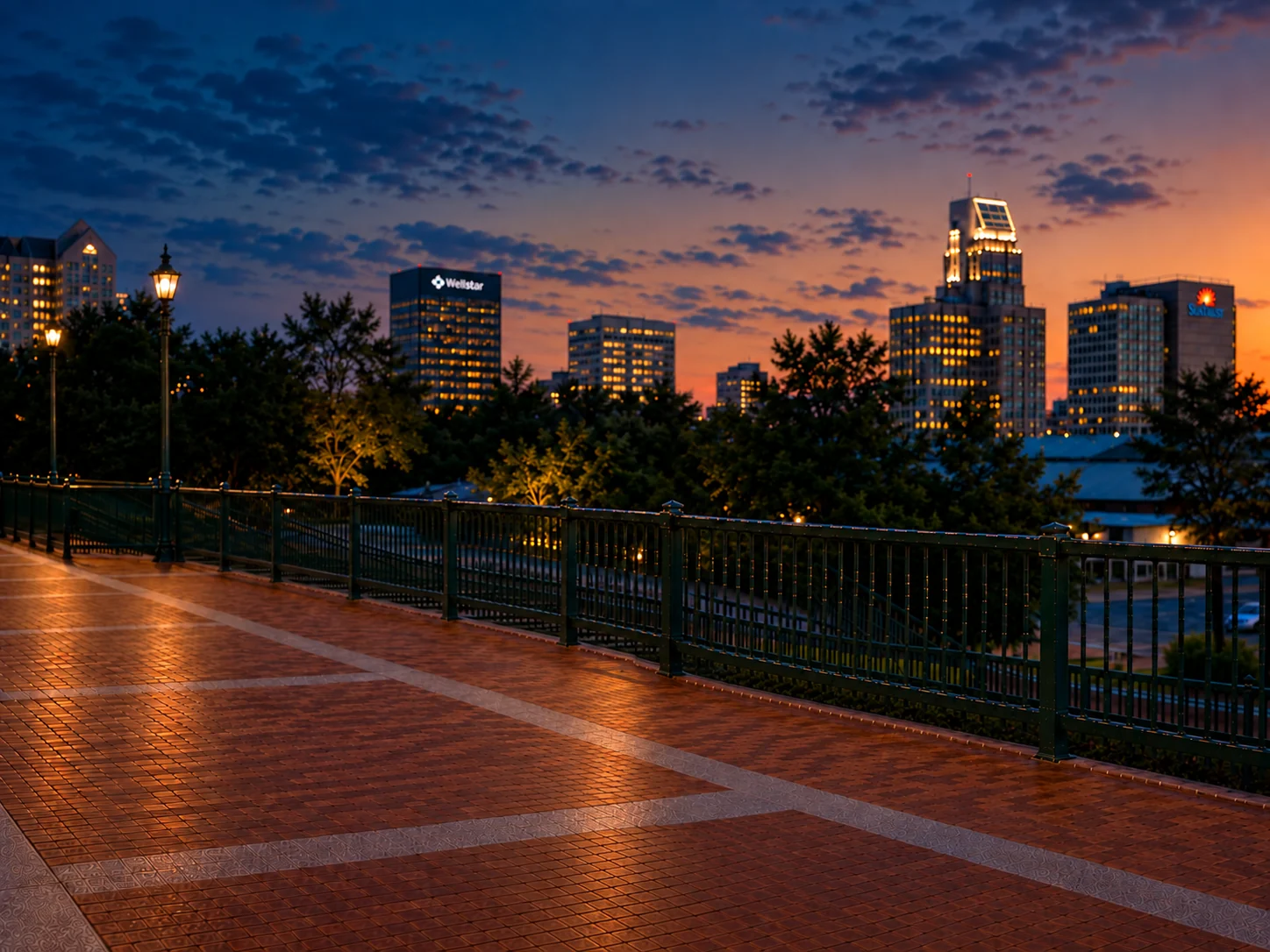 Augusta Riverwalk and the city skyline at dusk