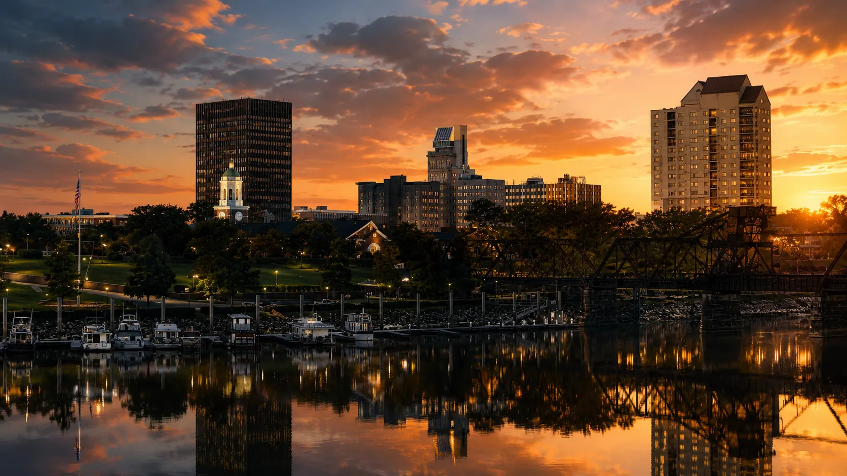 Downtown Augusta, Georgia skyline at sunset, reflected in the Savannah River